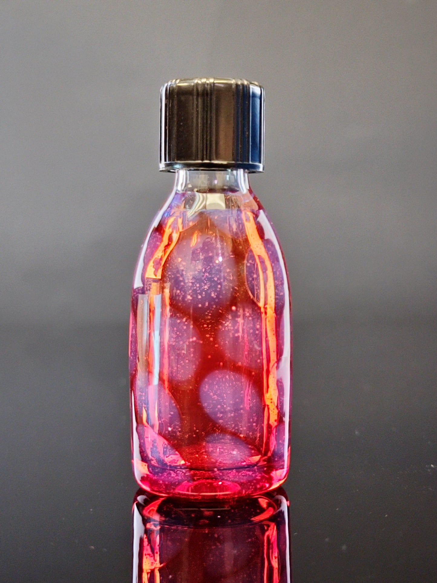 Transparent Red Spray Bottle