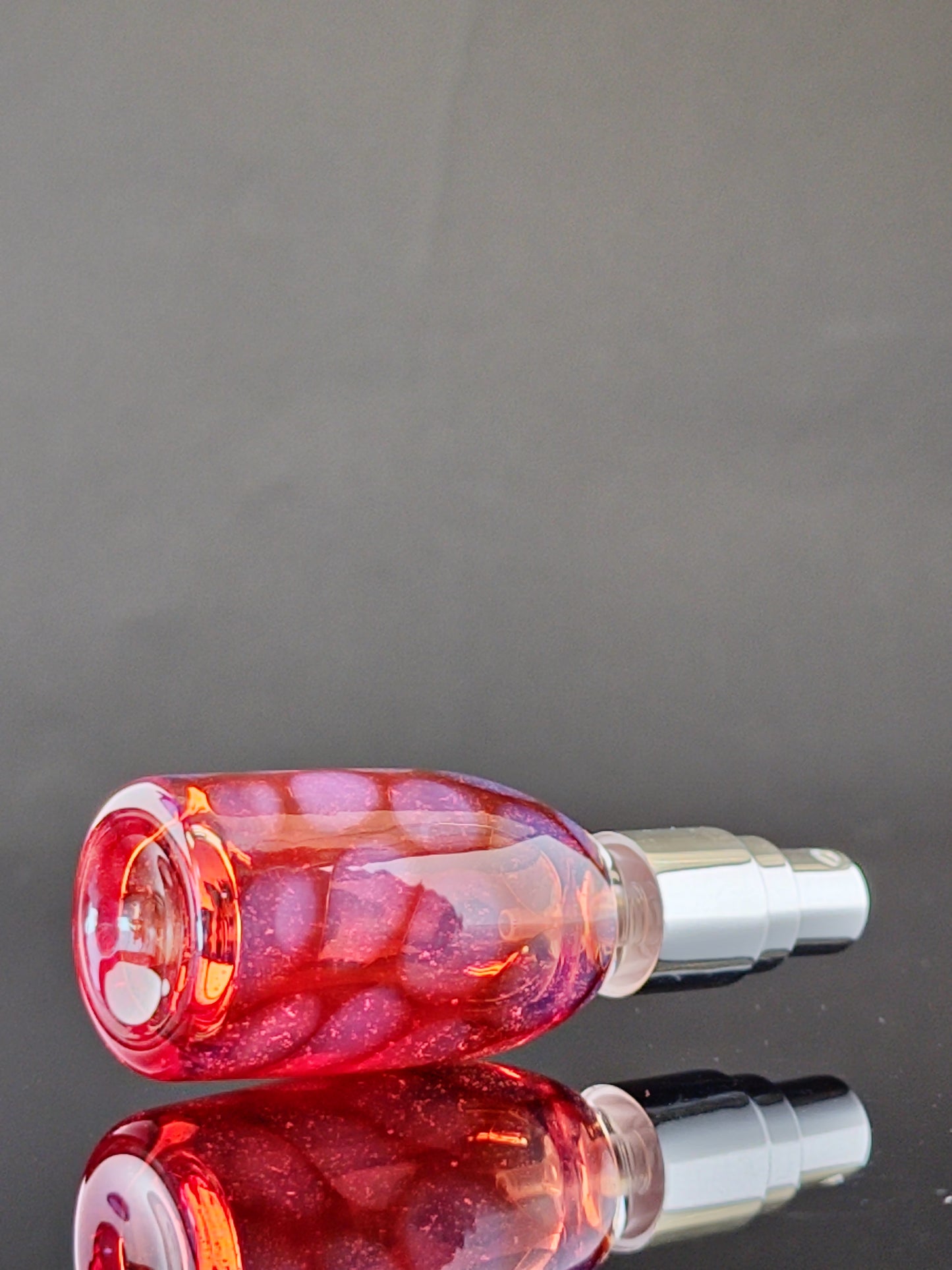 Transparent Red Spray Bottle