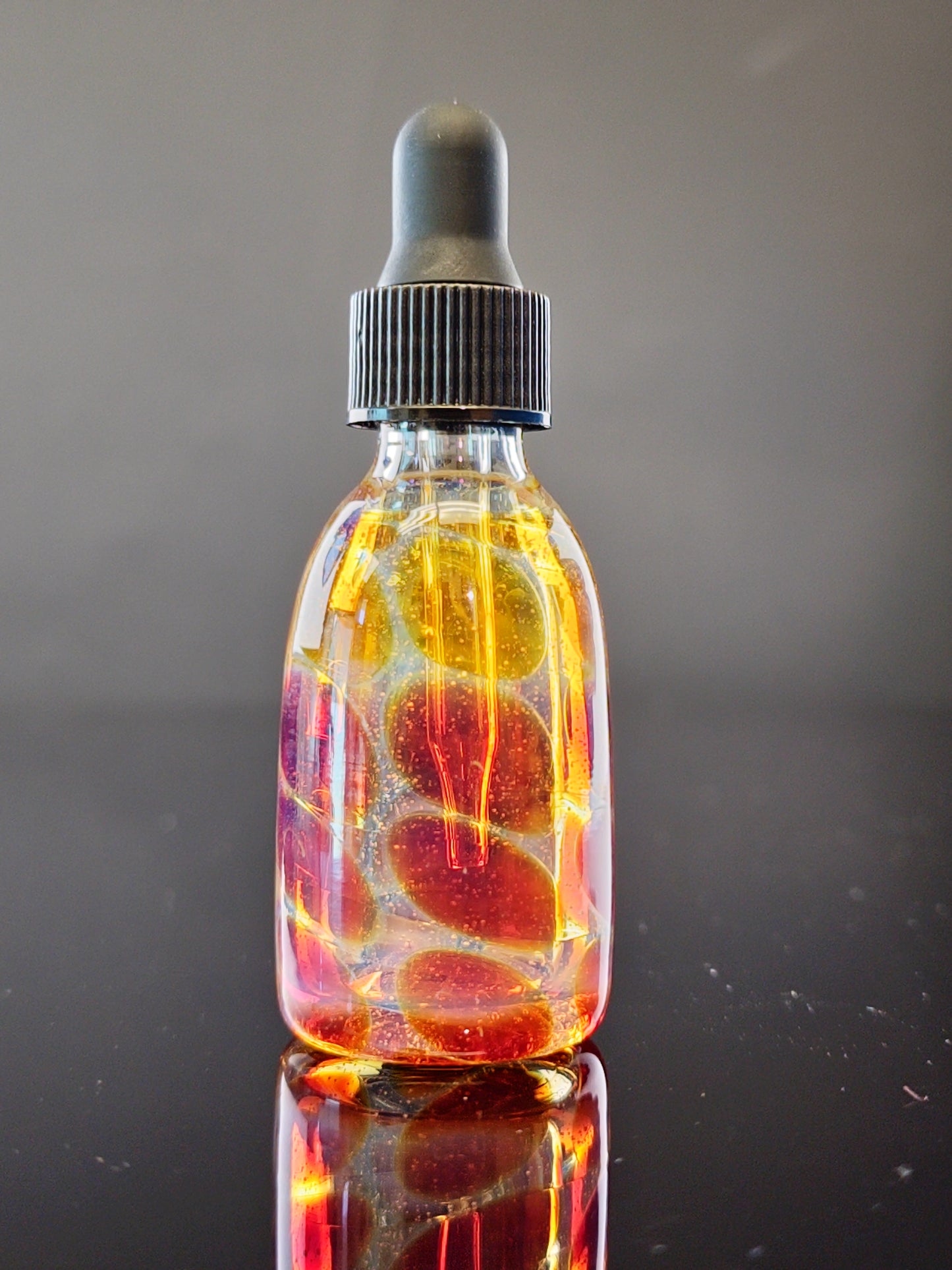 White Dropper Bottle with Amber/Purple Pattern