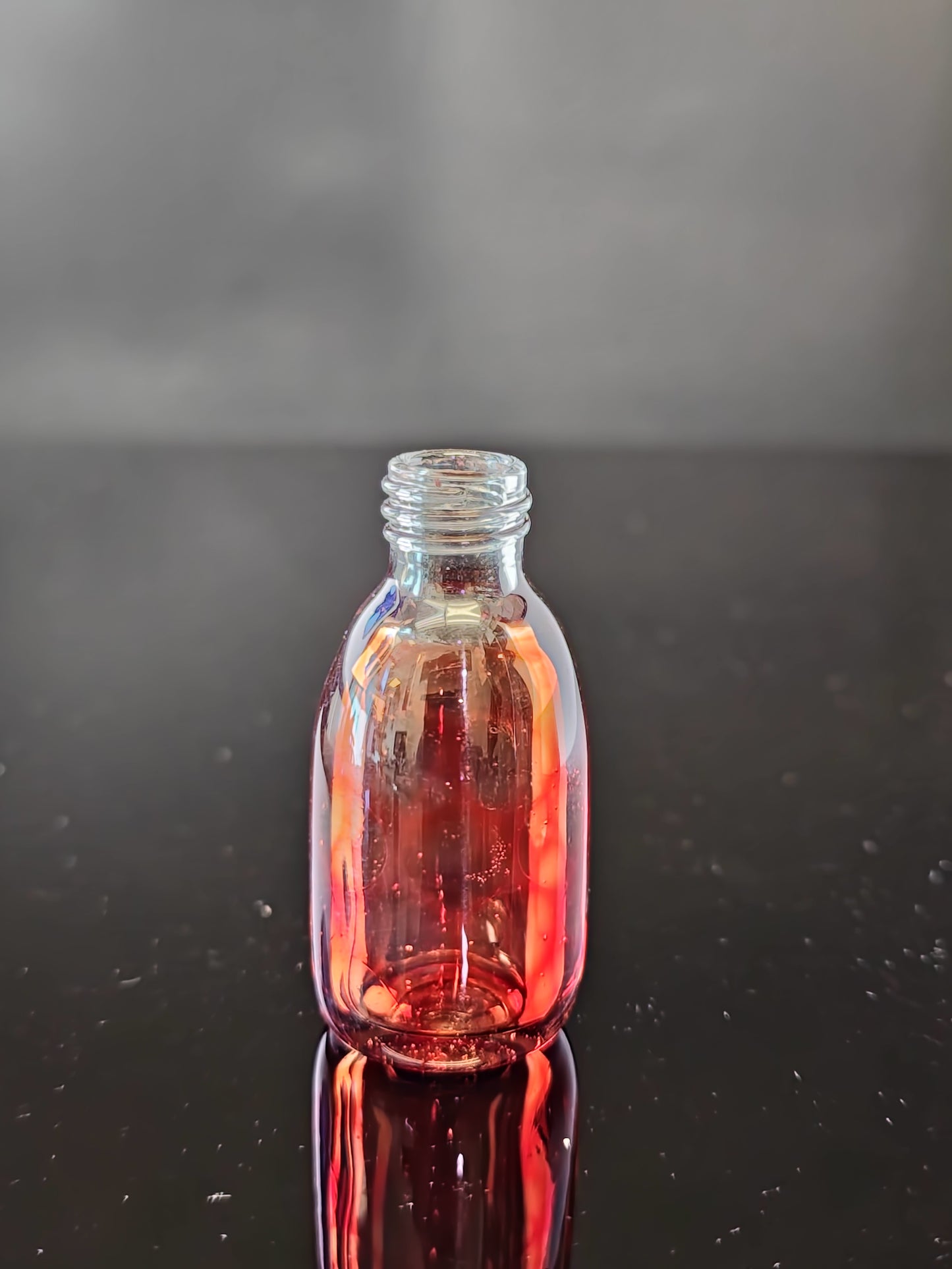 Transparent Red Vial