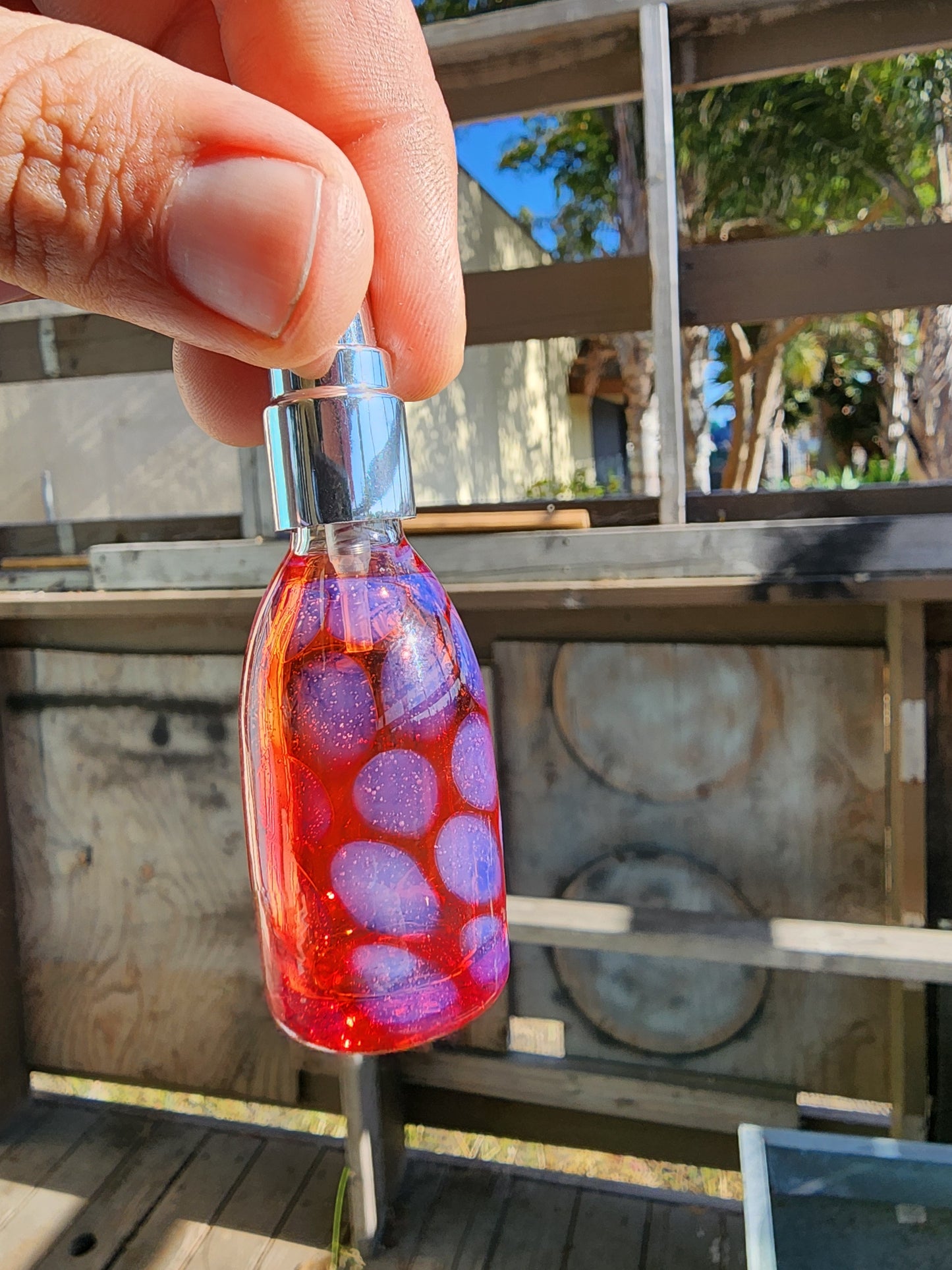 Transparent Red Spray Bottle