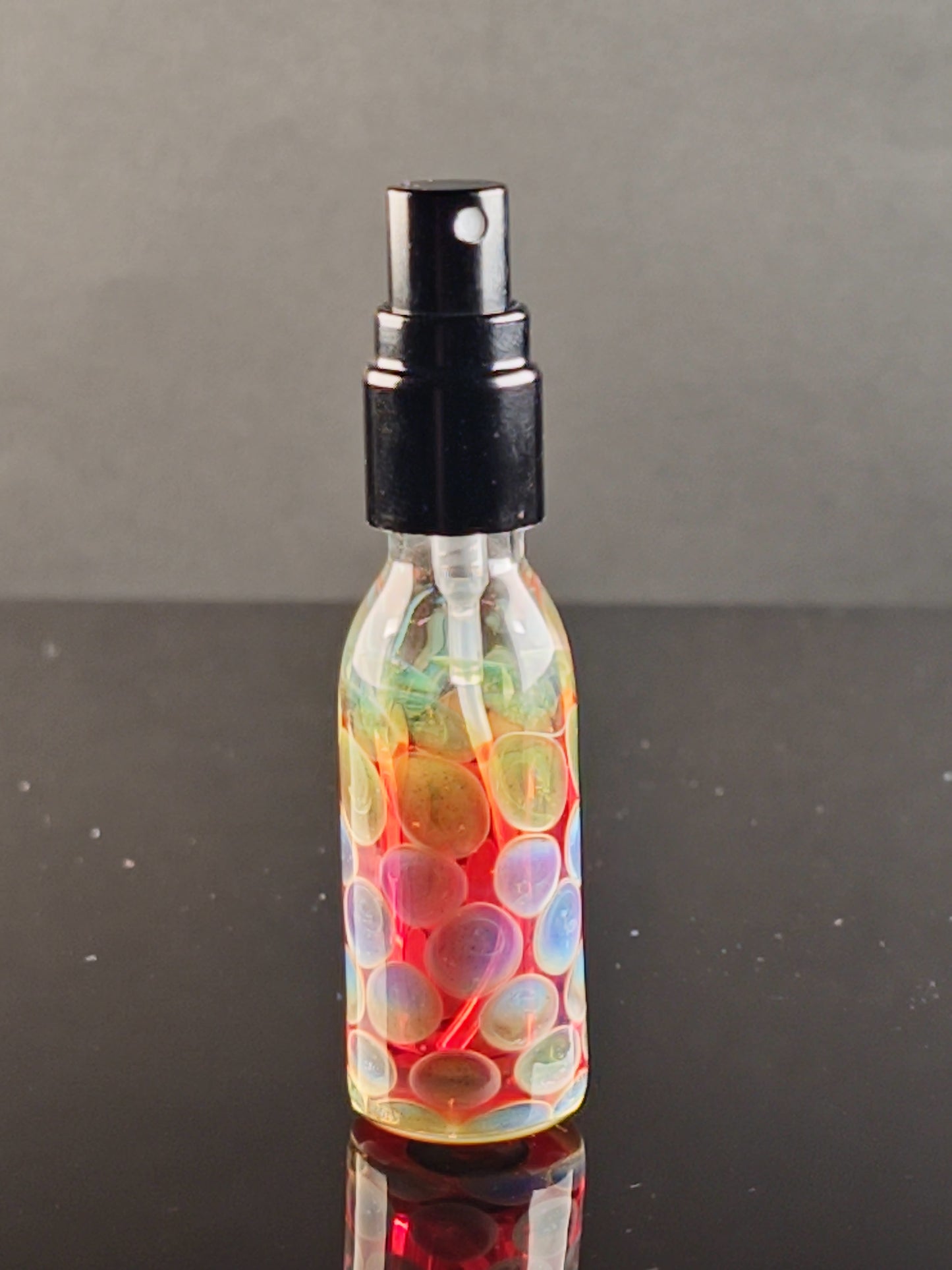 Red Spray Bottle with Purple/Green Dots