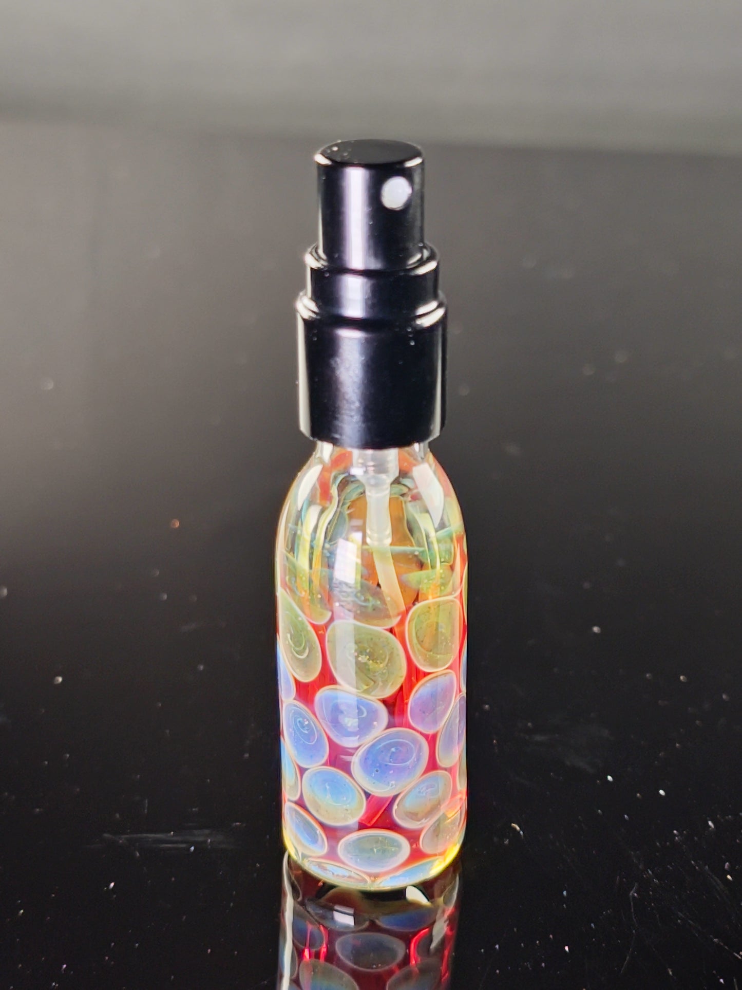 Red Spray Bottle with Purple/Green Dots